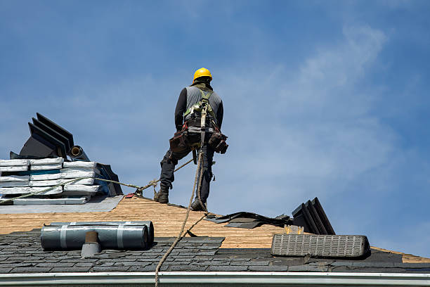 Professional Roof Replacement technician working in Tryon, OK